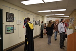 Fall 2018 Art in the Library Reception: Gallery with viewers-3