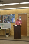 Art in the Library Exhibition Spring 2018, Roger Weaver at podium