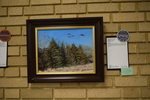 Art in the Library Exhibition Spring 2018, Geese over Cedars on wall with award: Notable Work